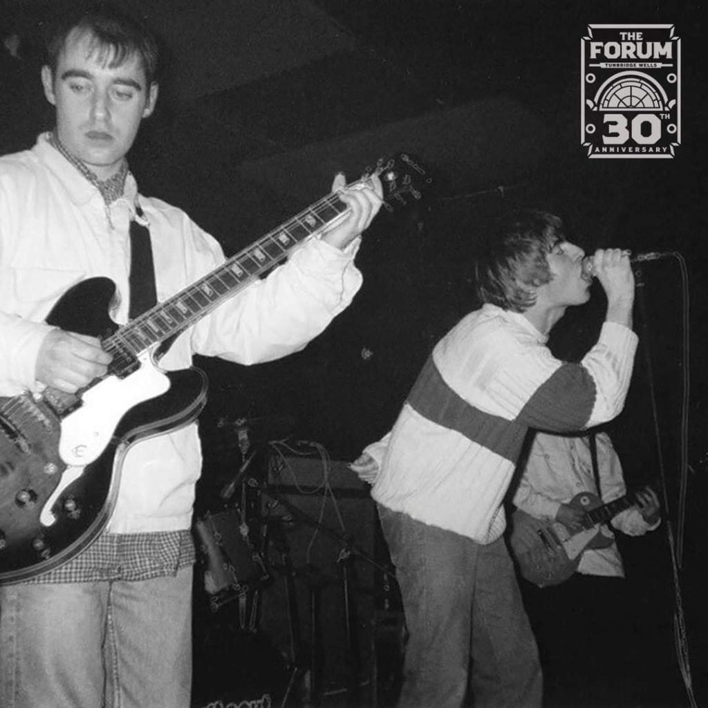 Britpop legends, Oasis playing live at the Tunbridge Wells Forum in 1994