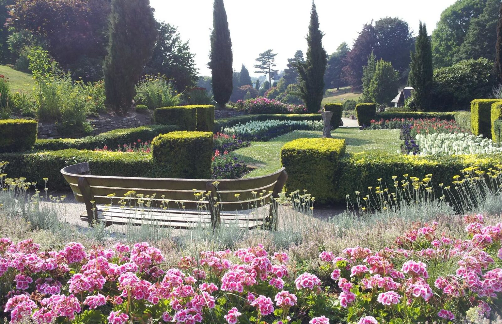 calverley grounds in tunbridge wells, with cypress trees and flower beds